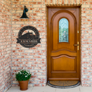 Edwards_Carriers_-_Metal_Shop_Sign_Black_Brick_Entrance_Mockup-thumb.png